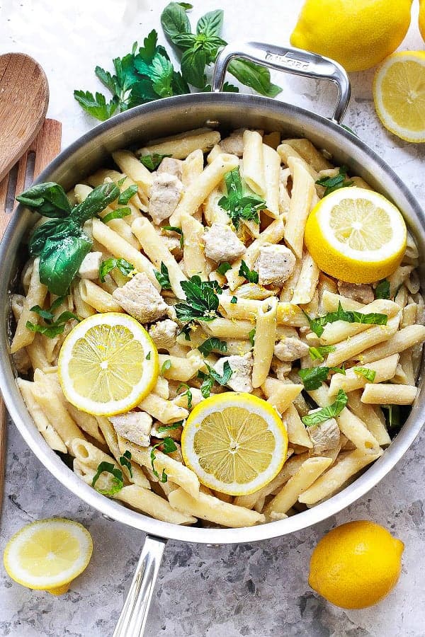 Creamy Lemon Chicken One Pan Pasta makes the perfect easy weeknight meal. Best of all, this skillet pasta is made with lemon, chicken, spinach, parmesan and ricotta. Everything including the pasta is cooked in one pot and ready in under 25 minutes.