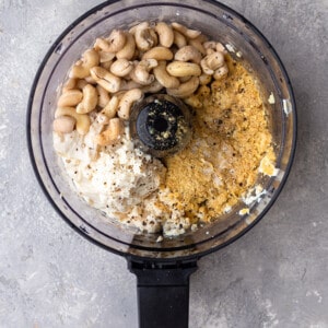 Nutritional yeast, miso, cashews and coconut cream in a blender