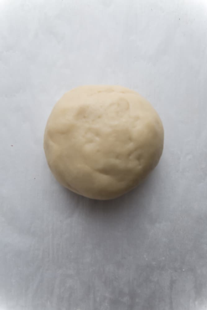 A ball of pie crust dough