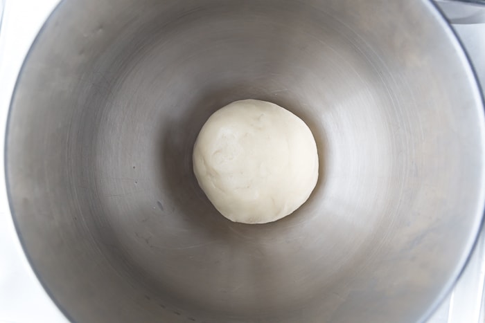 Top view of a ball of Keto Sugar Cookie dough in a metal bowl