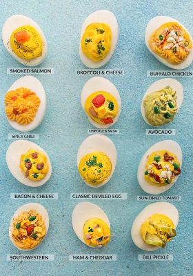 Perfect Deviled Eggs - 12 different ways are the perfect easy make-ahead appetizers for Easter Mother's Day or any weekend or holiday brunch. Best of all, they are low carb, keto and packed with protein. Flavors include: smoked salmon, broccoli & cheese, buffalo chicken, spicy chili, chipotle & salsa, avocado, bacon & cheese, classic deviled egg, sun-dried tomato, southwestern, ham & cheddar & dill pickle