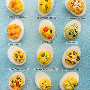 Perfect Deviled Eggs - 12 different ways are the perfect easy make-ahead appetizers for Easter Mother's Day or any weekend or holiday brunch. Best of all, they are low carb, keto and packed with protein. Flavors include: smoked salmon, broccoli & cheese, buffalo chicken, spicy chili, chipotle & salsa, avocado, bacon & cheese, classic deviled egg, sun-dried tomato, southwestern, ham & cheddar & dill pickle