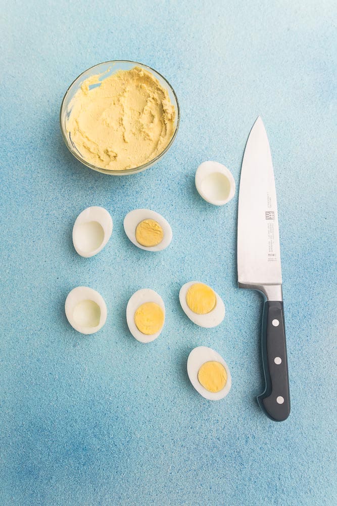 Perfect Deviled Eggs - 12 different ways are the perfect easy make-ahead appetizers for Easter Mother's Day or any weekend or holiday brunch. Best of all, they are low carb, keto and packed with protein. Flavors include: smoked salmon, broccoli & cheese, buffalo chicken, spicy chili, chipotle & salsa, avocado, bacon & cheese, classic deviled egg, sun-dried tomato, southwestern, ham & cheddar & dill pickle