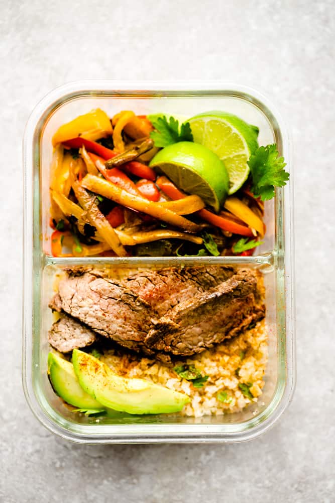 Easy Steak Fajitas are tender, juicy and full of flavor! Best of all, they come together super quick and are perfect for busy weeknights. Marinated in a homemade fajita spice blend and cilantro a delicious Tex-Mex cilantro lime marinade. Low carb and keto friendly serving options and great for meal prepping on Sunday for work or school lunchboxes or lunch bowls.