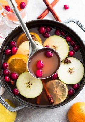 This Easy Homemade Apple Cider Recipe is the perfect easy drink for fall and the holiday season. Best of all, this easy version is made with a blend of juices and infused with apples, orange, lemon, cranberries, cinnamon and cloves. Set and forget and makes your house smell amazing! Warm up with a mug by a cozy fireplace.