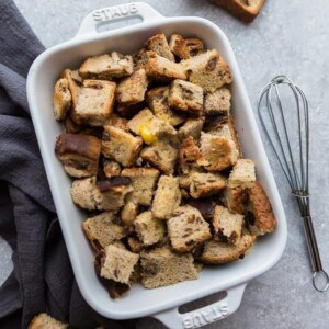 Cubed bread in a casserole dish