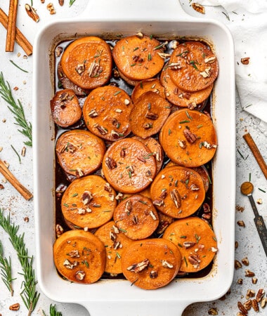 Overhead view of candied sweet potatoes in a baking dish