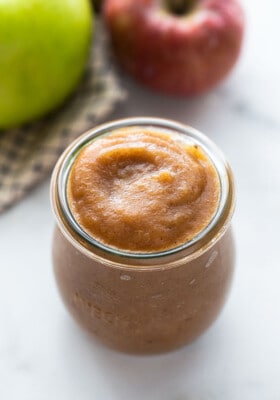 Top side view of easy apple butter in a glass jar