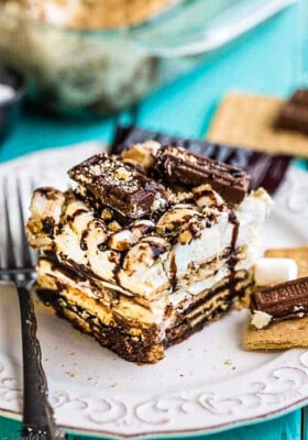 A square of No Bake S'mores Icebox Cake on a plate with a fork
