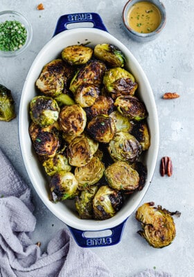 Top view of cooked Brussels sprouts in an oval casserole dish