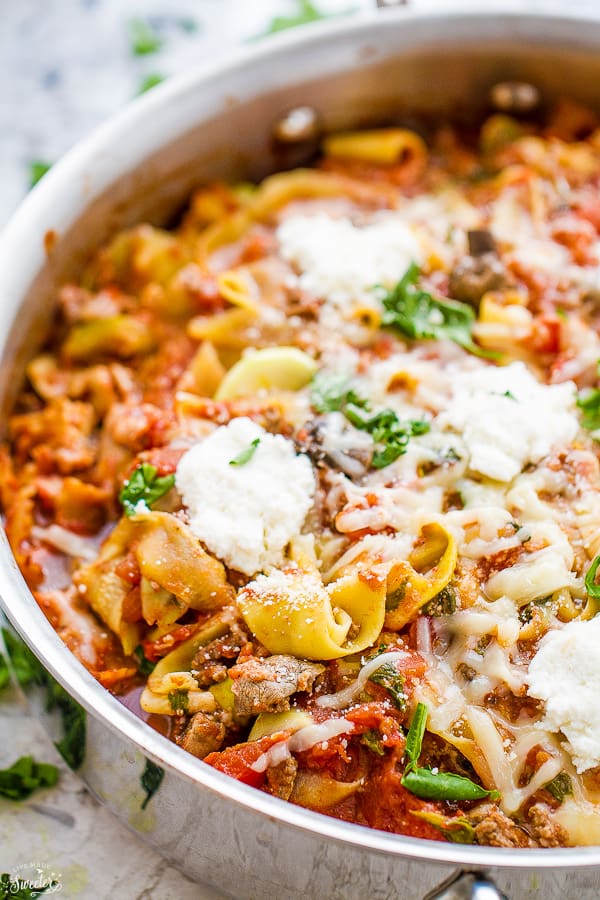 Healthy One Pan Zucchini Noodle Skillet Lasagna Zoodles - makes the perfect easy weeknight dish! Best of all, it's lower carb & makes a delicious twist on lasagna. Gluten free - no one will miss the pasta with this dish! Plus a VIDEO!