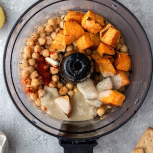 Sweet potatoes, chickpeas and spices in a food processor to make hummus