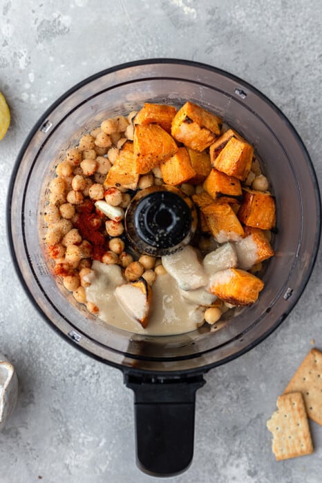 Sweet potatoes, chickpeas and spices in a food processor to make hummus