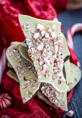 Top view of stack of homemade peppermint bark on a red napkin