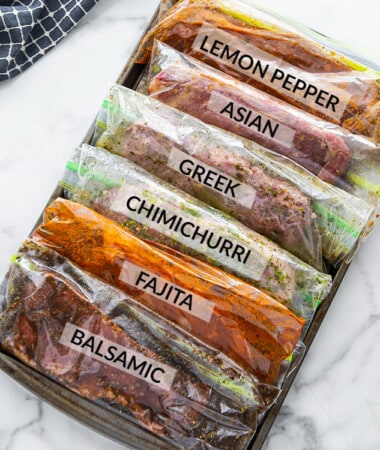 6 marinated sirloin steaks in ziplock bags with labels