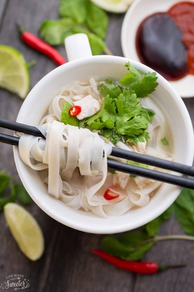 Top view of a mug of Faux Chicken Pho with chopsticks