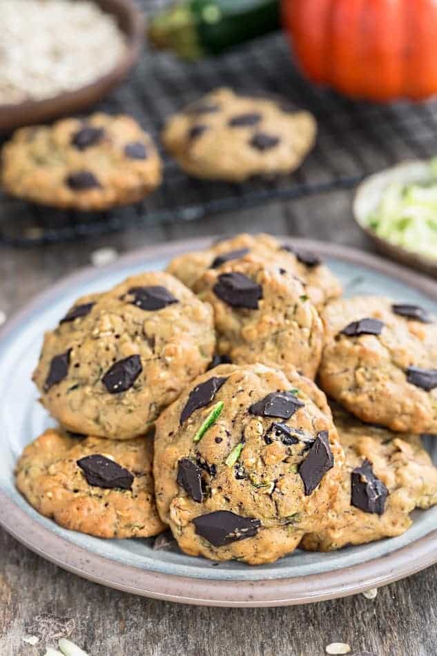 Front view of zucchini cookies on grey plate.