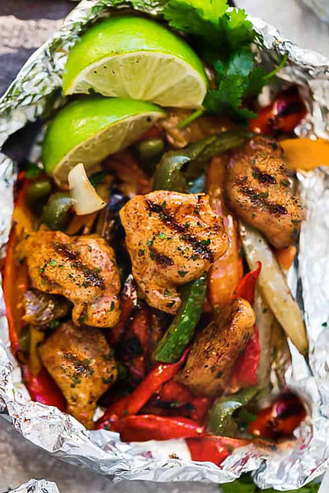 Chicken Fajita Foil Packets are the perfect easy meal for summer grilling and cookouts. Best of all, they're loaded with all your favorite Tex Mex flavors and make a low carb, paleo and keto friendly meal.