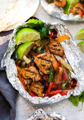 Chicken Fajita Foil Packets are the perfect easy meal for summer grilling and cookouts. Best of all, they're loaded with all your favorite Tex Mex flavors and make a low carb, paleo and keto friendly meal.