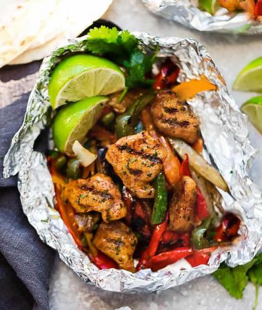 Chicken Fajita Foil Packets are the perfect easy meal for summer grilling and cookouts. Best of all, they're loaded with all your favorite Tex Mex flavors and make a low carb, paleo and keto friendly meal.