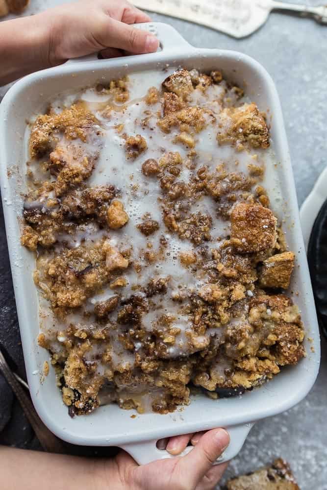 Cinnamon French Toast Bake - the perfect easy make ahead casserole for weekend or holiday breakfasts and brunch. Best of all, tastes just like cinnamon rolls without all the work. Made with thick cinnamon toasted bread topped with a brown sugar and cinnamon streusel. and an oeey gooey glaze.