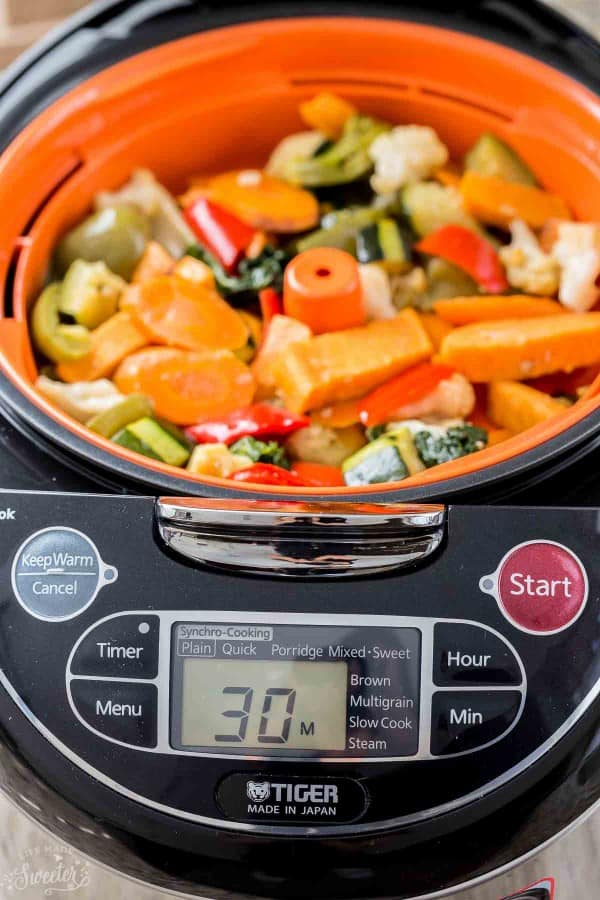 Chopped stir-fry vegetables in a rice cooker