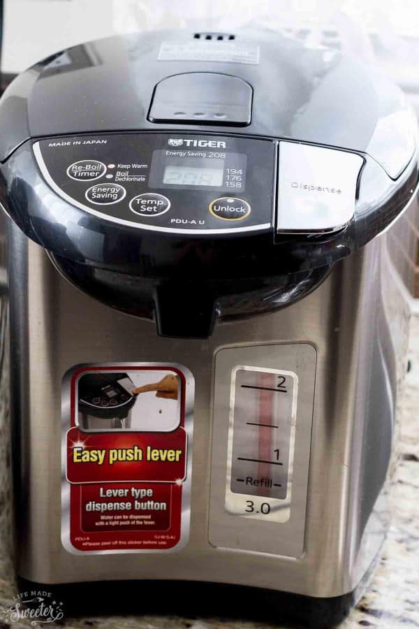 Close-up of a Tiger brand rice cooker appliance