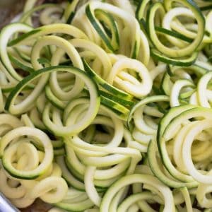 Close up view of zucchini noodles.