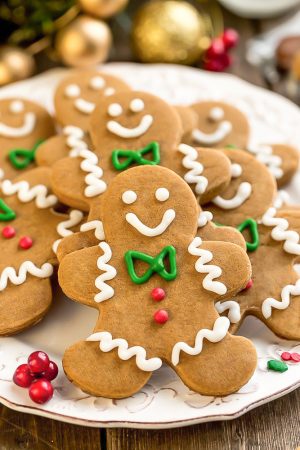 This recipe for Gingerbread Men cookies are a classic holiday favorite. They are perfectly spiced with cinnamon, ginger, molasses and bake up soft and chewy with slightly crisp edges.