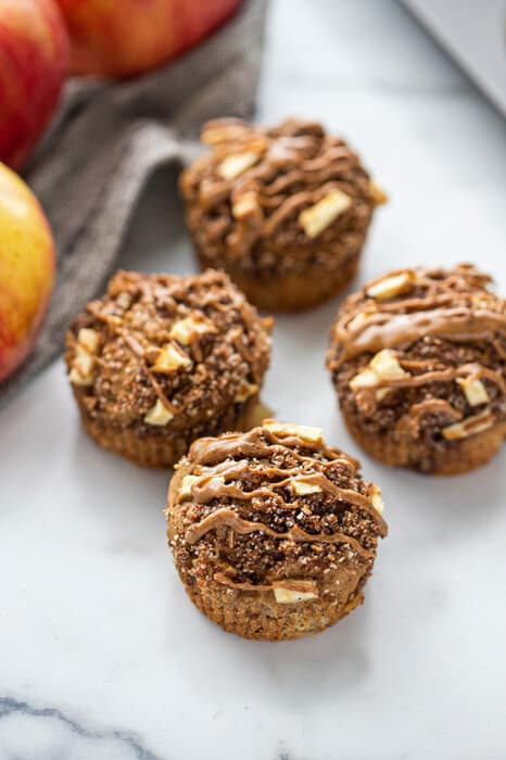 Apple muffins on a counter