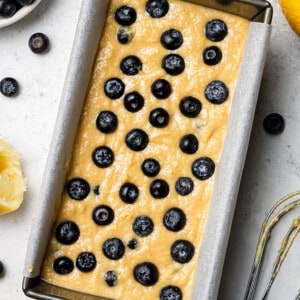 Lemon blueberry bread batter in a loaf pan