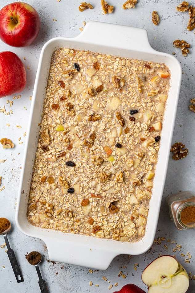 Apple Baked Oatmeal Batter in a white casserole pan