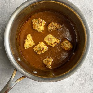 Crispy tofu in a pot of orange suace