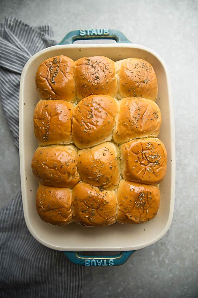 Top view of a dozen rolls in a rectangular baking dish