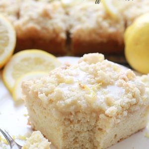 Greek Yogurt Lemon Coffee Cake - A bright and flavorful lightened up lemon coffee cake with a crunchy streusel topping and a sweet & tangy lemon glaze.