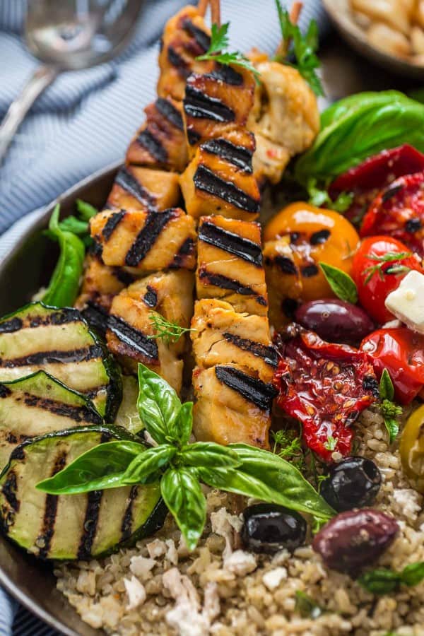 Top view of a Grilled Greek Chicken Souvlaki Quinoa Brown Rice Bowl