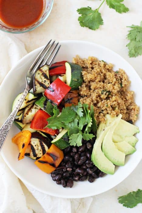 Overhead view of grilled vegetable enchilada bowls