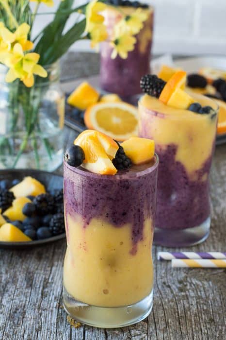 Hawaiian Berry Smoothie in a glass topped with fruit