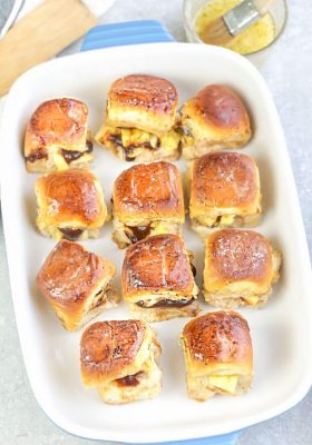 Hawaiian Chicken Sliders are the perfect easy appetizers for feeding a crowd. Best of all, they come together in less than 30 minutes with tender chicken, sweet pineapples and gooey cheese. Serve these delicious burgers for game day, summer parties, barbecues and potlucks!
