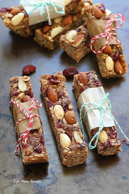 Homemade Granola bars with almond and cranberry, wrapped in paper
