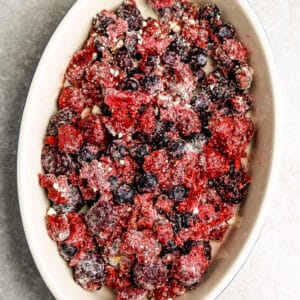 Top view of mixed berry filling for fruit crisp in a oval baking pan