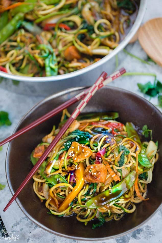 brown serving bowl of Chicken Chow Mein made with zucchini noodles