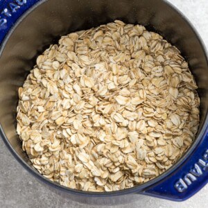 A Silver and Navy Blue Pot Filled with Old-Fashioned Oats