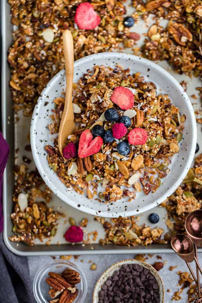 Overhead image of colorful healthy granola with oats and berries.