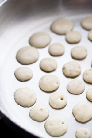 Close-up view of mini pancake batter in a pan