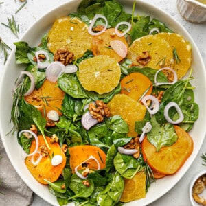 Spinach Orange Salad in a white bowl