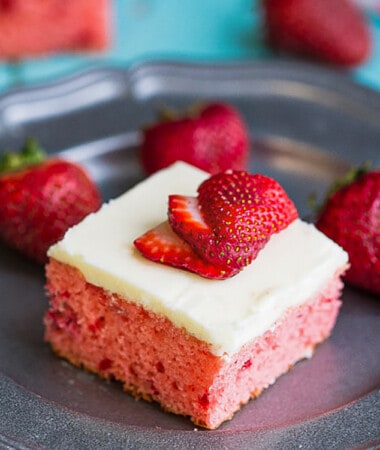 A slice of healthy strawberry cake on a stainless steel plate
