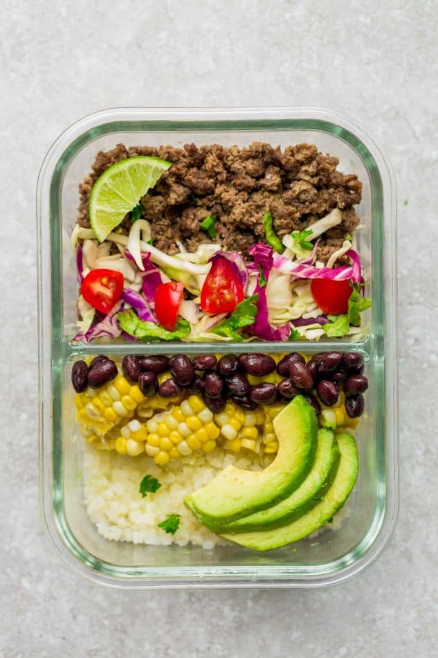 Healthy Taco Bowls - a quick & delicious lightened up 30 minute lunch or dinner perfect for busy weeknights. Best of all, made with a flavorful homemade Tex-Mex seasoning and options for low carb, keto and meal prep.