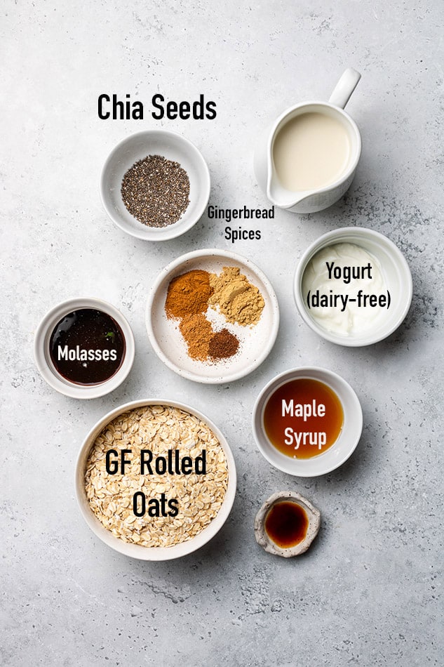Overhead view of ingredients for Gingerbread Overnight Oats in individual bowls