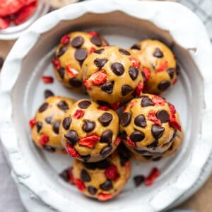 Top view of keto cookie dough bites in a white bowl